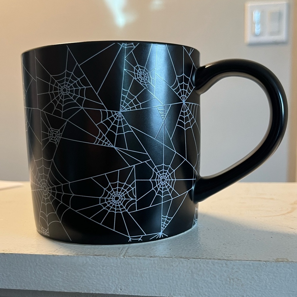 Black Mug with White Spiderweb Design